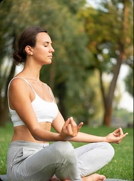 Woman doing yoga outdoors